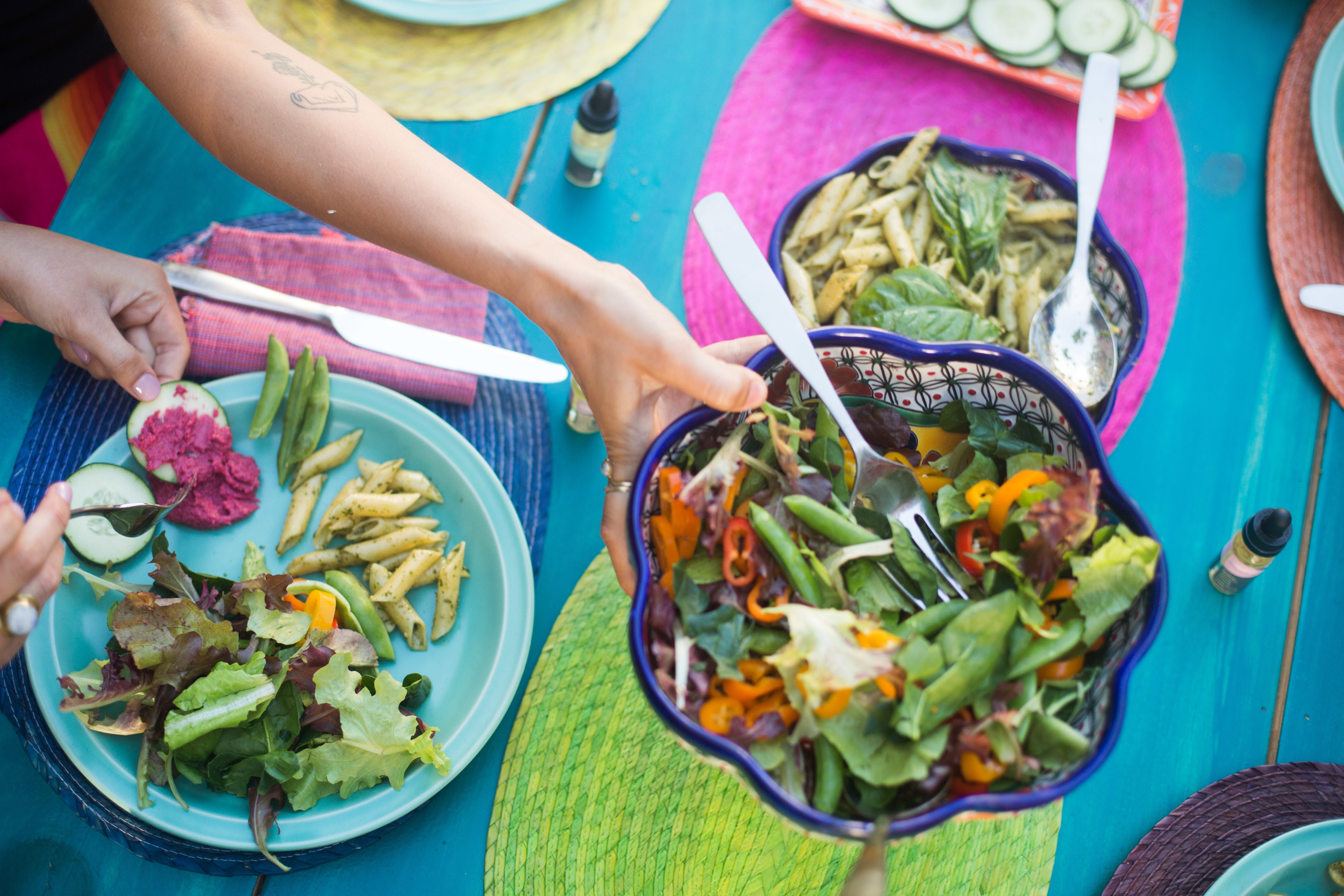 Dinner table with CBD tincture bottles visible